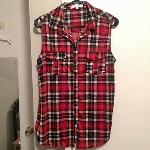 Sleeveless red paid button down